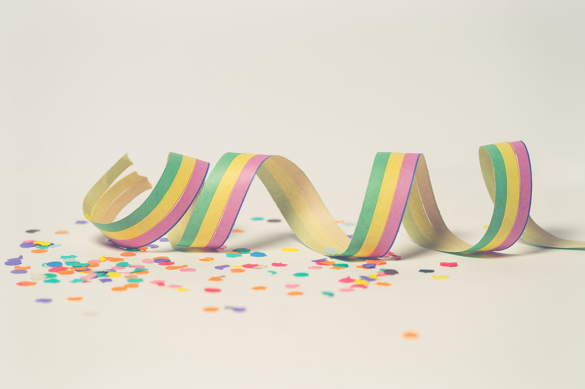 Confetting and rainbow ribbon